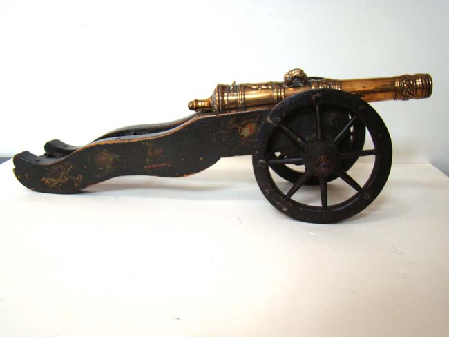 A wonderful 17th century Dutch bronze barreled salute cannon with original painted carriage